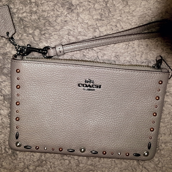 Coach Handbags - ❤ Coach Prairie Rivet Wristlet ❤